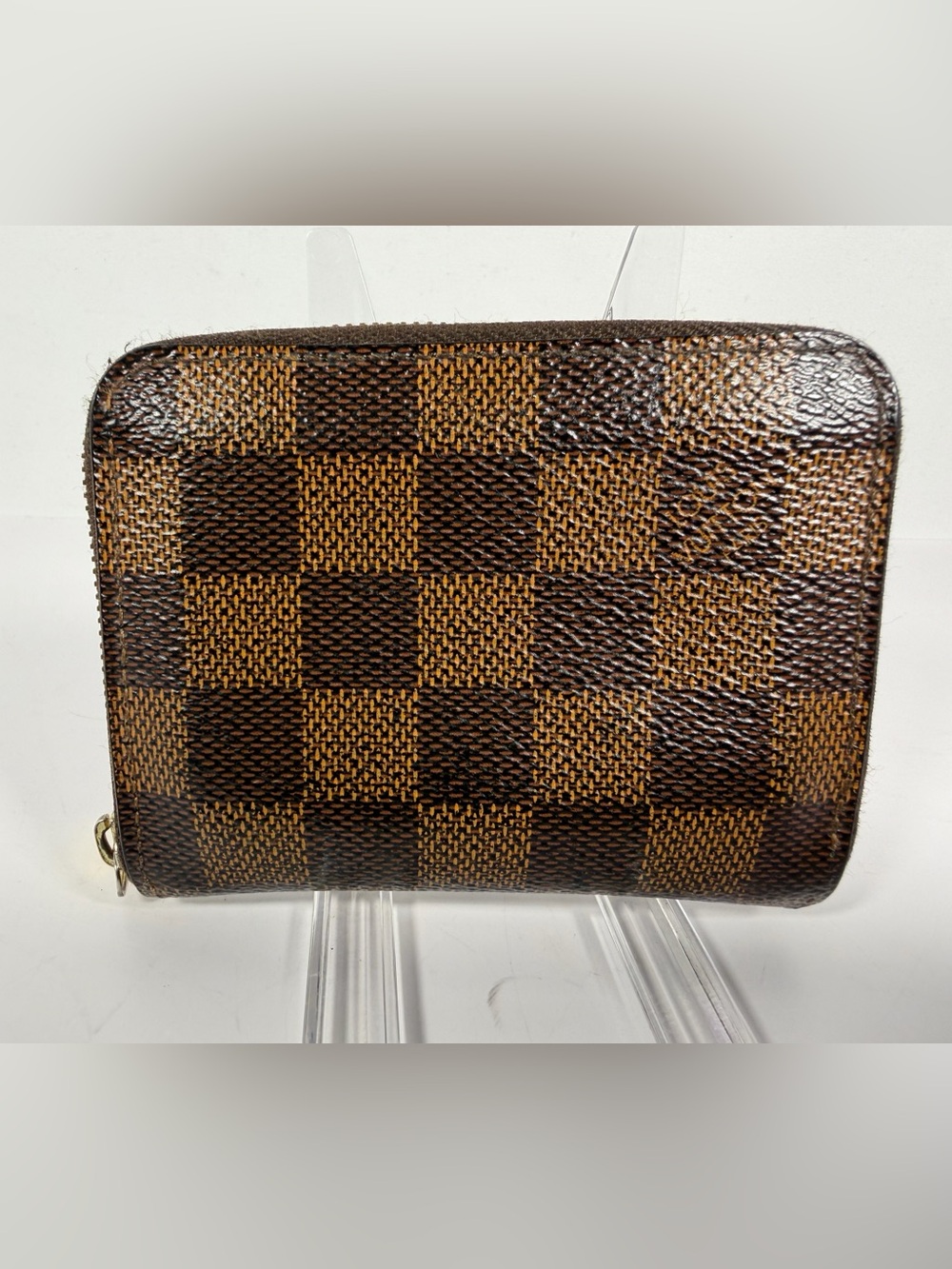 1282: Louis Vuitton Zippy Coin Purse Damier Ebene Canvas Brown